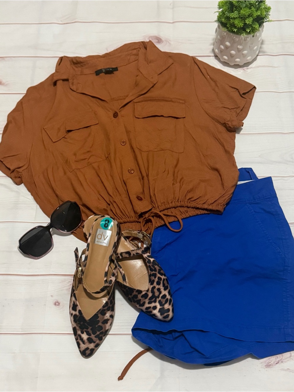 Toxik3 Women's brown blouse with front buttons and adjustable drawstring.